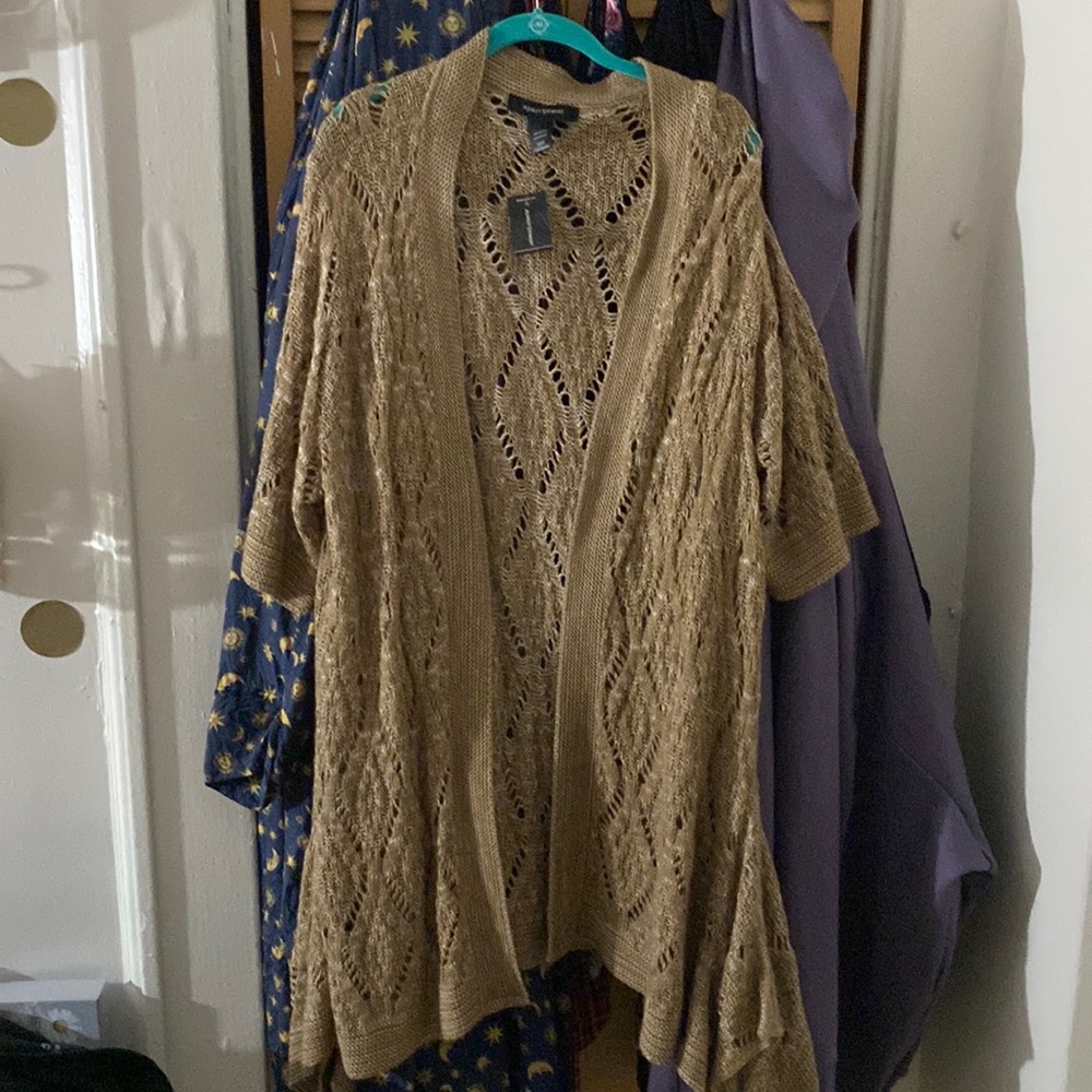 Beige and white knit cover all